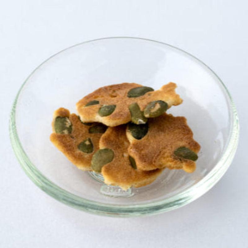 Rice flour and pumpkin seed bite-sized crackers